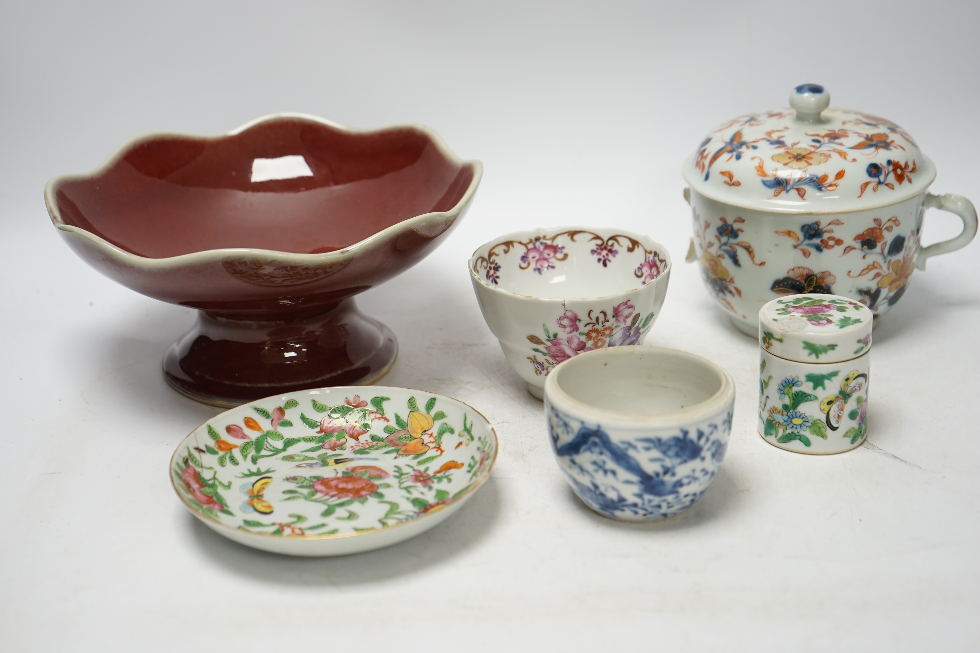 Chinese ceramics to include a sang de boeuf pedestal bowl and a famille rose dish, 20cm diameter. Condition - pedestal dish and one other good, others poor